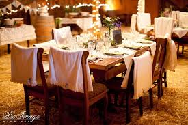 Draping Blankets Over The Back Of The Chairs At Any Wedding Or Event Is Such A Sweet Way To Keep Gues White Chair Covers Chair Covers Wedding Chair Decorations