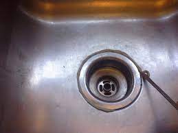 Clean all dirt and old caulking from sink. How To Use Plumbers Putty On Kitchen Sink Drain