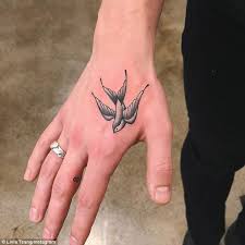 Hygiene and cleanliness is our top priority. Hailey Baldwin S Beau Shawn Mendes Sports New Ink Of Bird Express Digest