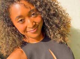 Naomi Osaka's Compassionate Moment with a Butterfly at the Australian Open