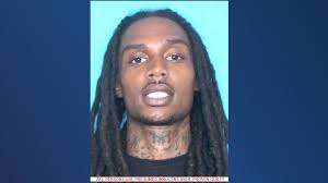Police looking for murder suspect