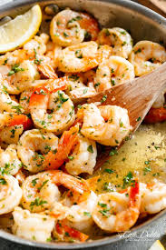 When the pan starts to steam and the olive oil starts to shimmer, add the shrimp and cook until they're pink and curling. Garlic Butter Shrimp Scampi Cafe Delites