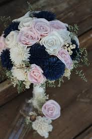 Peonies, roses and garden roses. This Listing Features A Bouquet Featuring Light Pink Sola Rose Buds Navy Blue Zinnias And Roses In A Creamy Iv Pink Bouquet Bridal Bouquet Blue Bridal Bouquet