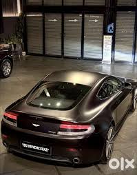 Image result for Onyx Black 2011 Aston Martin