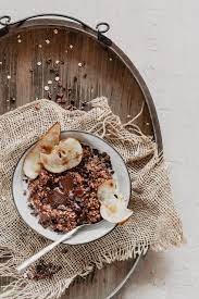 Chocolate Pear Oatmeal With Grilled Caramelized Pear Recipe Chocolate Oatmeal Food Healthy Food Photography