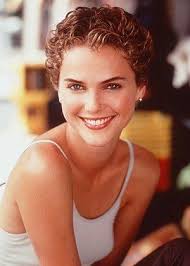 The 31 Most Iconic Hair Moments In Pop Culture History Curly Pixie Haircuts Haircuts For Curly Hair Curly Hair Styles