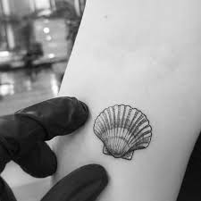 A tattoo is just a fashion accessory that girls really like to flaunt. Blackwork Fineline Vintage Micro Tattoo Of Seashell By Alexandyr Valentine Pattern Tattoo Seashell Tattoos Shell Tattoos