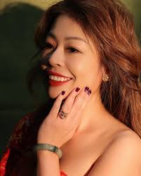 Embrace elegance with our stunning Batik attire, graced with a vibrant  fusion of rich reds and fiery oranges. The strapless cut exudes a  sophisticated silhouette, perfect for making a bold statement. Delicate