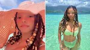 Halle Bailey channels her Little Mermaid character Ariel in green bikini  during beach vacation