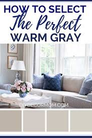 Living room paint color ideas light grey. See The Secret To Picking Out The Perfect Warm Gray From Interior Designers Plus 11 Foolproof Gray Pa Grey Paint Living Room Warm Gray Paint Grey Painted Rooms