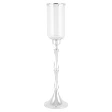 Glass candle holder has a twisted stem with a flat base. Tall Standing Hurricane Candle Holders