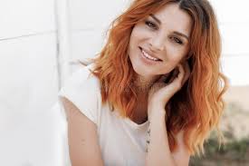 Happy Ginger Guy Running in Front and Friend Stock Photo