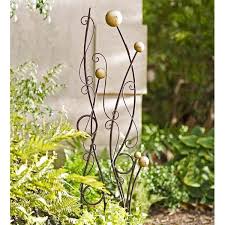 This Gold And Black Abstract Metal Trellis Is An Eye Catching Combination Of Wrought Iron Circles Arcs And Curlicues T Metal Trellis Iron Trellis Arch Trellis