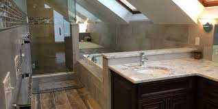 Armstrong ceilings makes ceiling planks and tiles that can be installed directly over an old popcorn or drop ceiling in just a weekend. Remodeling A Bathroom With Pitched Roof Monk S Home Improvements