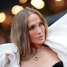 Jennifer Lopez embraced theatrics in a plunging dress and billowing cape  for a night