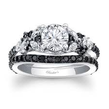 Black diamond halo ring in 14kt white gold, $4,900, catherineangiel.com. Barkev S Black Diamond Bridal Set 7950sbk Barkev S