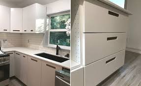Ikea Sektion Marsta Cabinetry Creates A Smooth Minimal Open Plan Kitchen Maison