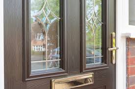 Carefully adjust the front door window glass (a) until you can see the bolts, then loosen them. Composite Front Door Replacement Project In Epsom Surrey Hamiltons