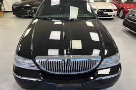 Image result for Light Ice Blue 2009 Town Car