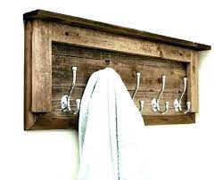 Then place whatever you want on them for a simple, beautiful, cheap shelf. Wood Towel Rack With Hooks Hooks Rack Towel Towelrackbathroomrustic Wood Towel Rack Bathroom Towel Rack Bathroom Diy Towel Rack