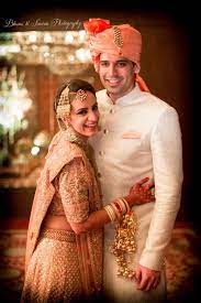 Photo Of Peach And Gold Bridal Lehenga Wedding Dress Men Indian Bride And Groom Indian Groom Wear