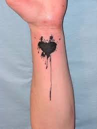 Black Heart Tattoo Lionel Tattoomagz Com Black Heart Hearttattoo Inspirationaltattoo Lionel In 2020 Black Heart Tattoos Bleeding Heart Tattoo Heart Tattoo