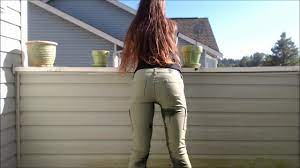 Girl pisses cargo pants on balcony - ThisVid.com
