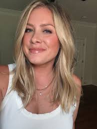 Scroll back to see where my hair started in January 2025! This year led to  growth (longer than I've worn it in YEARS) and a more natural, lived in  blonde. I couldn't