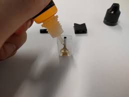 Remove the plastic mouthpiece and remove the stoppers to find the fill holes. 5 Fill It Cigalike Freak