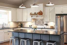 We did not find results for: A Picture Of A Kitchen With White Cabinets Black Countertops And A Gray Isla Black Countertops Replacing Kitchen Countertops White Cabinets Black Countertops