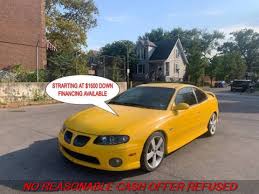 Image result for Yellow 2004 Pontiac