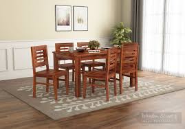 This charming dining set is the perfect addition to your dining room or kitchen. Buy Janet 6 Seater Dining Table Set Honey Finish Online In India Wooden Street