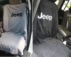 Black And White Jeep Wrangler Seat Covers One Car Slipon Beach Towel Car Seat Covers Easily Slides Down Over Headrest Jeep Jeep Wrangler Accessories Jeep Wrangler Unlimited Accessories Jeep Accessories