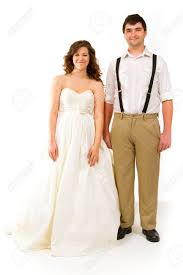 Regel für die berufliche kleiderwahl und tipps für die kleidung im vorstellungsgespräch findest du hier! Eine Attraktive Frau Und Ihre Schonen Mann Tragen Ihre Hochzeit Kleidung Im Studio Agains Eine Isolierte Weissem Hintergrund Lizenzfreie Fotos Bilder Und Stock Fotografie Image 17514903