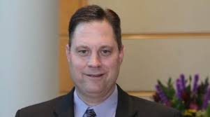 AJC top teacher Jim Reason of Gwinnett buoys students in pool and classroom