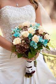 Summer bouquets for a stunning wedding range from modest and delicate to bold and vibrant. Blue And Cream Wedding Flowers Turquoise Wedding Wedding Bouquets Cream Wedding Flowers