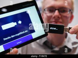 Darmstadt, Germany. 28th Mar, 2019. Thomas Greb (r) and Khanh An Do from  the Ludwig-Geißler-Schule in Hanau present fire helmets with head-up  display and infrared camera at the state competition of "Jugend