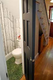 Love The Tree Wallpaper Such A Good Idea For A Wee Space Bathroom Under Stairs Closet Under Stairs Bathroom Design