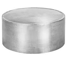 A coffee table, side table, or accent table is always there when you need a convenient place to set your drink or display decor. Zanzi Coffee Table Coffee Tables Living Room Categories Fantastic Furniture Austra Drum Coffee Table Hammered Coffee Table Contemporary Coffee Table