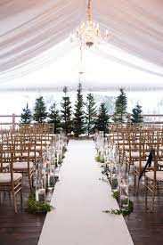 11 Evergreen Winter Wedding Decorations For That Chic Forest Feel Evergreen Wedding Wedding Ceremony Decorations Outdoor Winter Wedding Decorations
