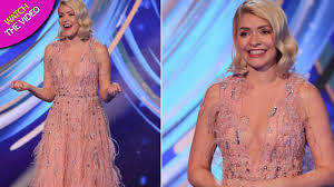 Holly willoughby looked stylish on thursday's this morning, wearing a tan roll neck and a black check pinafore dress by oasis, which cost £38.50 in the black friday sale. Dancing On Ice Slammed With Ofcom Cleavage Complaints Over Holly Willoughby S Dress Mirror Online