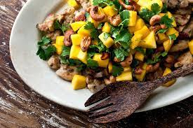 Black Pepper Chicken Thighs With Mango Rum And Cashews Recipe Recipe Chicken Stuffed Peppers Black Pepper Chicken Stuffed Peppers