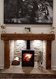 Natural elements, like stone, establish a classic and rustic feel, and marble tiles add an elegant and chic touch. Living Room Wood Burning Stove Ideas Design Novocom Top
