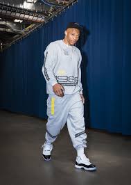 The upper gives way to a black patent leather mudguard, which then transforms to a translucent rubber outsole equipped with the concord. J23 Iphone App On Twitter Mens Streetwear Jordan 11 Outfit Mens Outfits