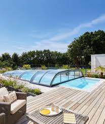 L'abri de piscine coulissant bas reste l'abri de piscine coulissant le moins cher. Abri De Piscine Bas En Aluminium Gustave Rideau