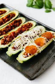 Delicious, low carb bbq chicken stuffed zucchini boats topped with cheddar cheese. Pizza Stuffed Zucchini Boats Downshiftology