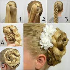 Double Braided Bun With Beautiful Flower Accessories Alldaychic Bridal Hairstyles With Braids Hair Styles Long Hair Styles