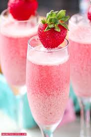 Classic champagne cocktail in a tall flute glass. Great Bridal Shower Idea Strawberry Cream Mimosas Bubbly Sparkling Champagne With Refreshing Raspberry And Str Brunch Drinks Easter Cocktails Yummy Drinks