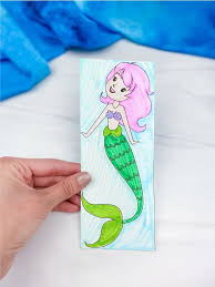Cut out the mermaid and her accessories. Free Printable Coloring Page Mermaid Bookmarks