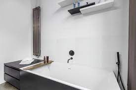 This is the polished marble porcelain look tile that we found and felt that matched well with the colour of the stone we picked. Dymo White 12x24 Glossy Ceramic Tile